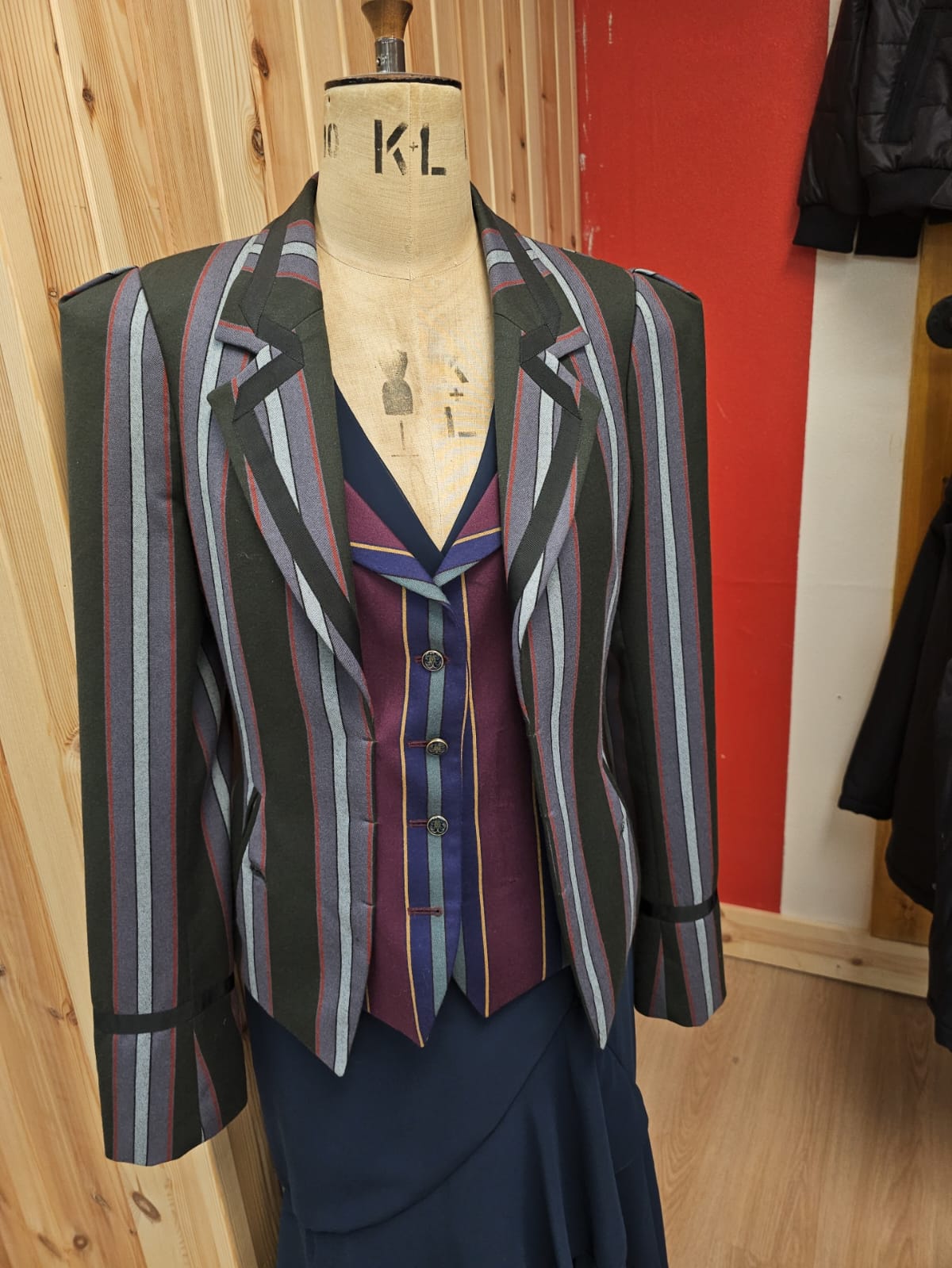 Custom women’s striped tailored suit with matching waistcoat, handmade by Alberto Ricci Tailoring.