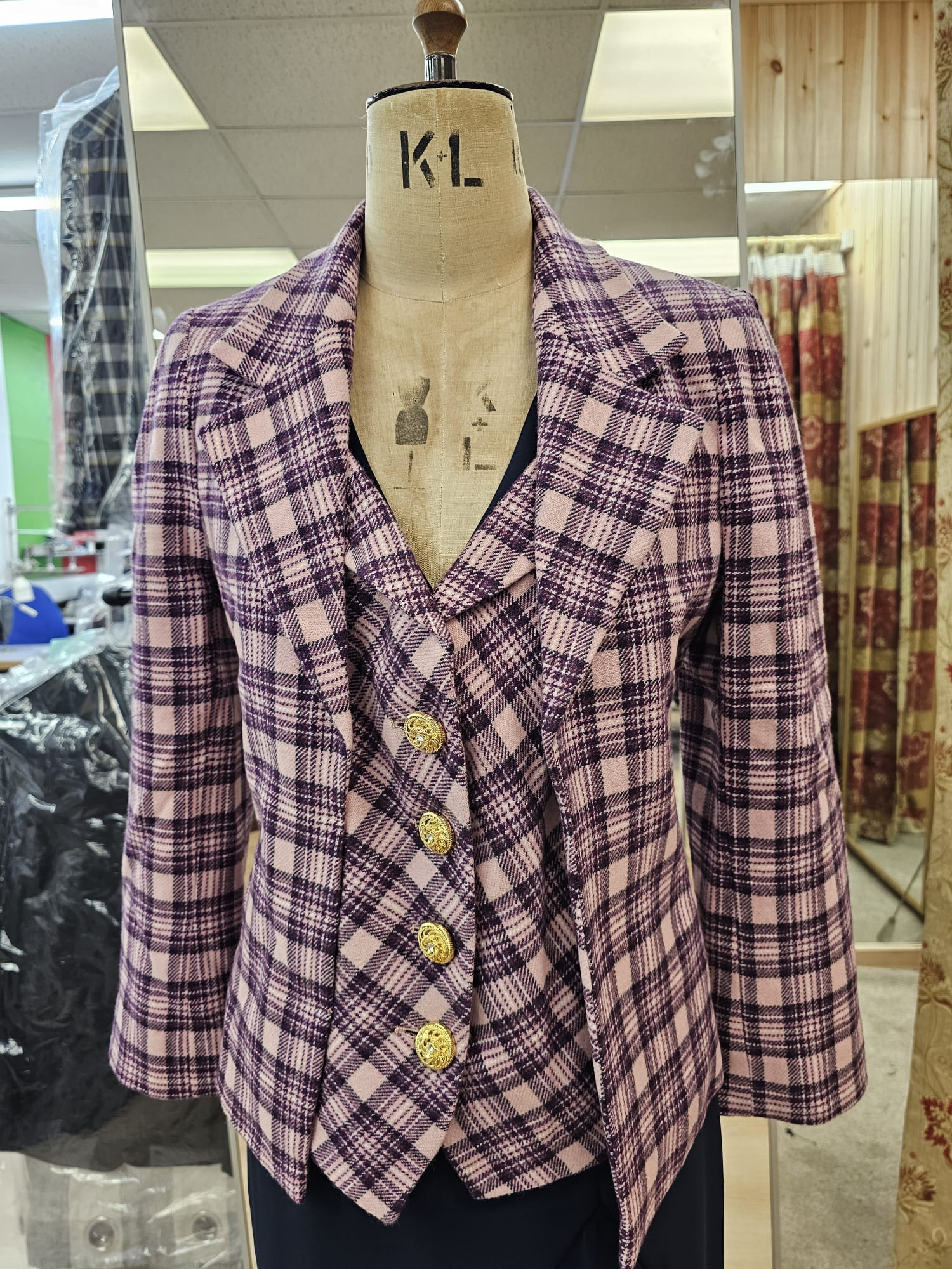 Purple checked women’s tailored suit with gold buttons, handcrafted by Alberto Ricci Tailoring in Forres, Scotland